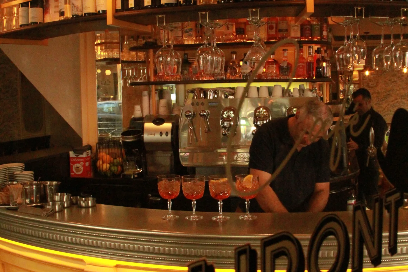 The counter at Café Dupont in full service