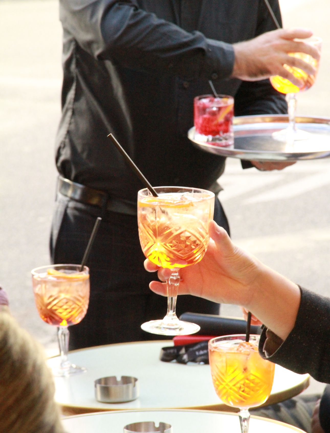 Two spritzes served on the terrace