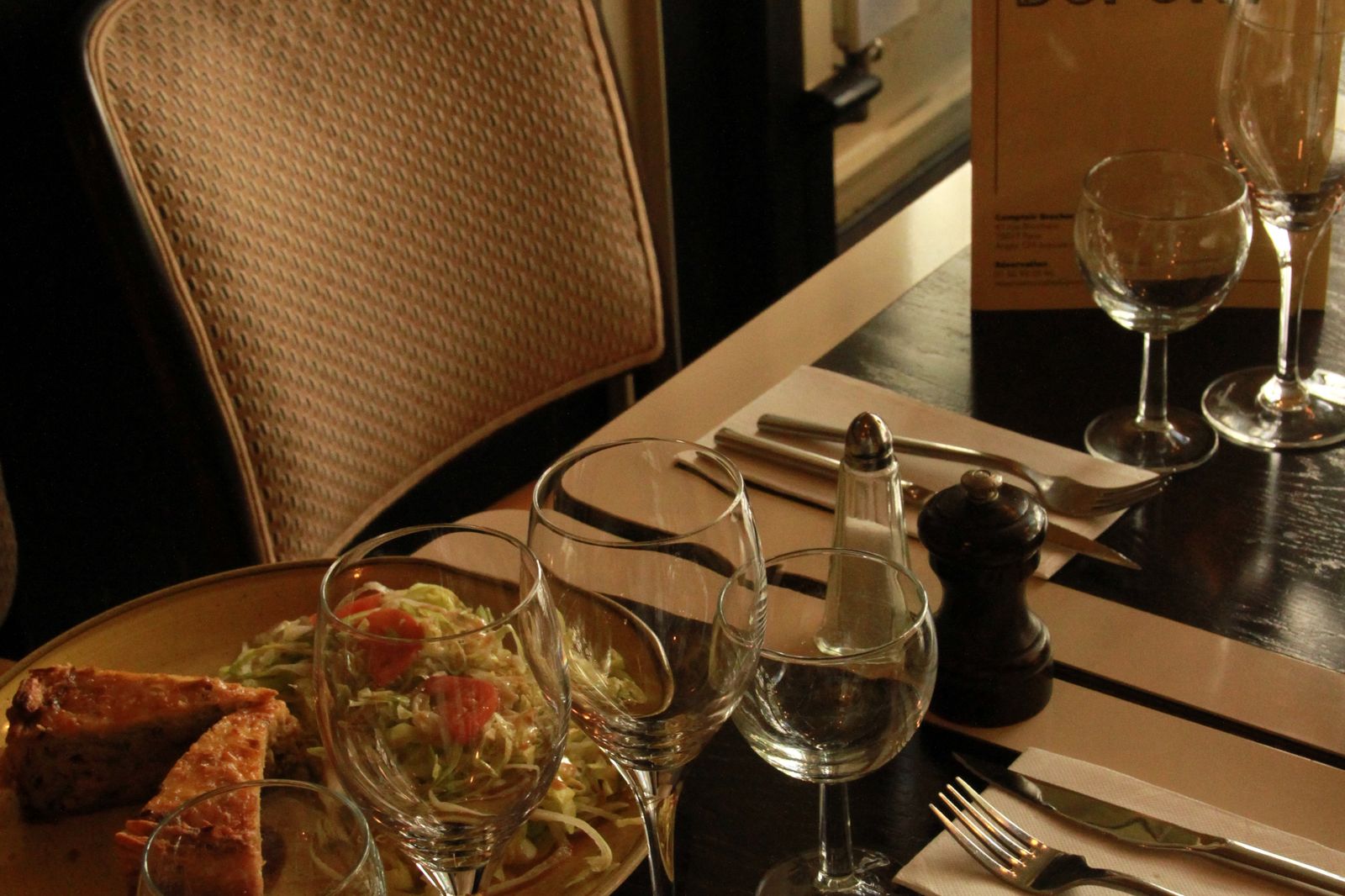 A laid table, glasses and a sharing board